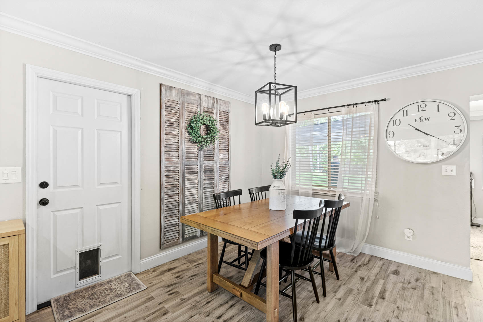 dining space with four person table and modern decor